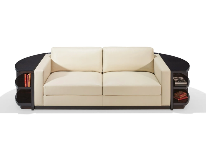 RONDO - Curved tanned leather sofa with integrated magazine rack _ HUGUES CHEVALIER